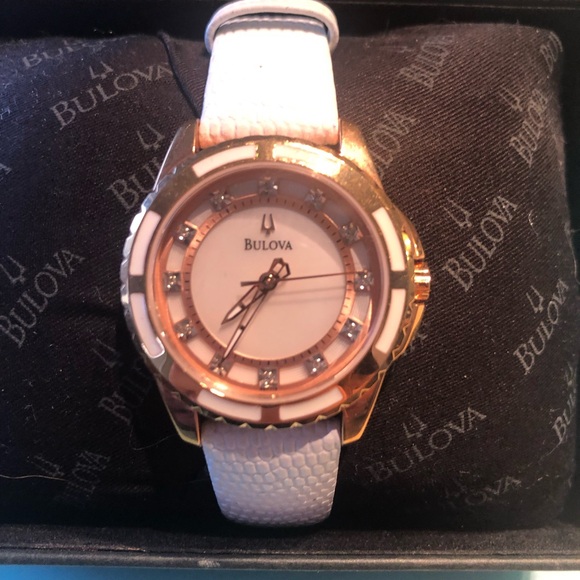 Bulova ladies rose gold with diamond accent white leather watch. - Picture 4 of 7